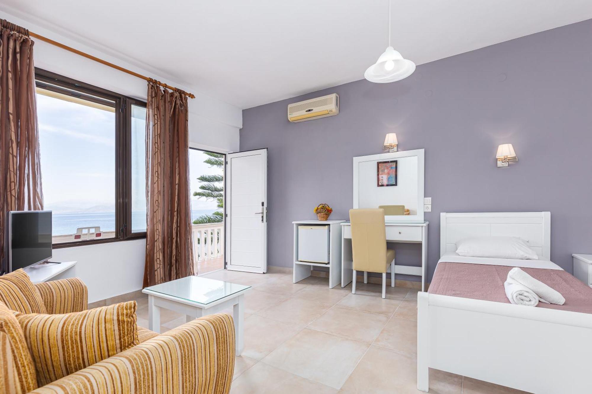 Oasis Hotel Perama  Extérieur photo